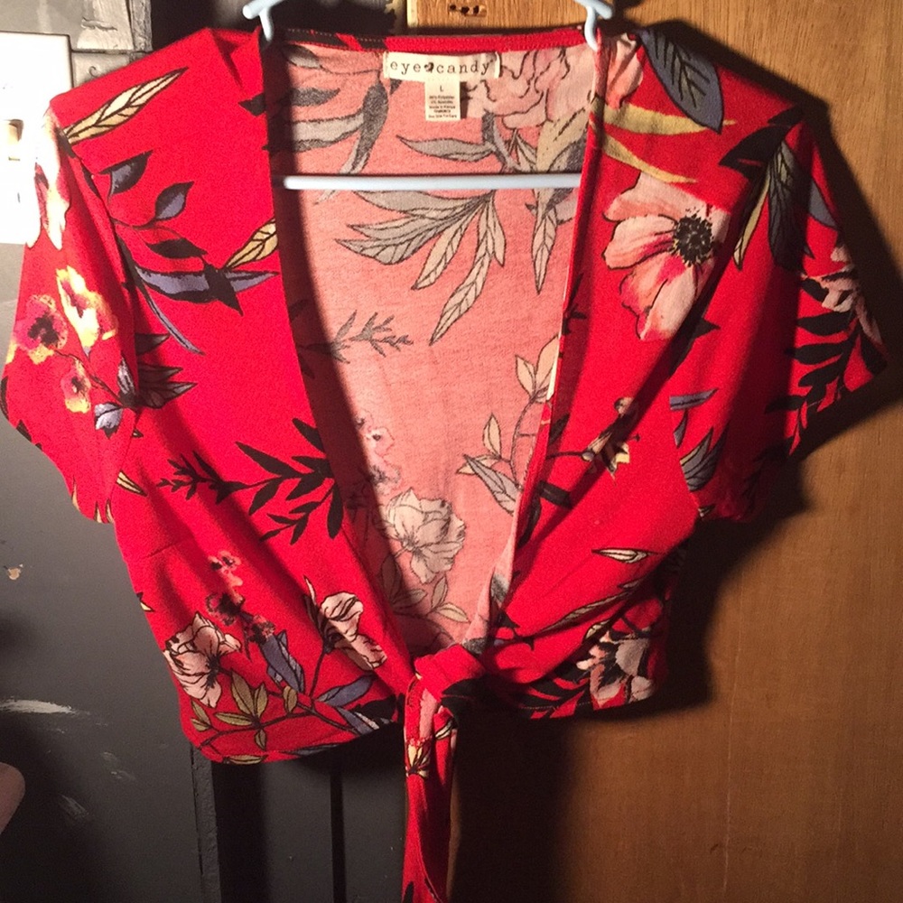A large eye-candy shirt. Never worn.
